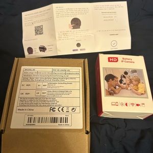 NWOT mini camera all part included , charging chord and owners manual